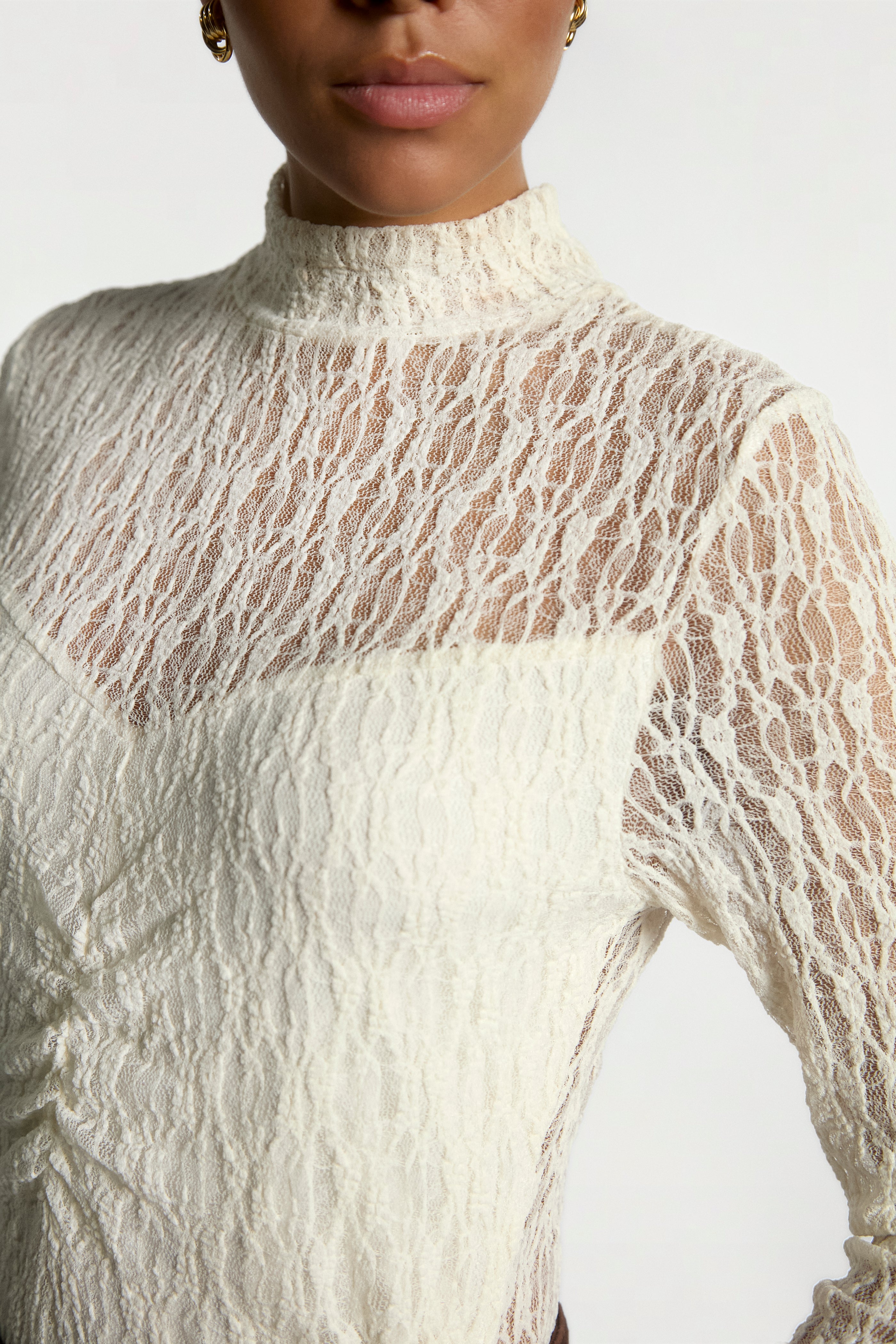 Aaiko Amy top crema collo alto