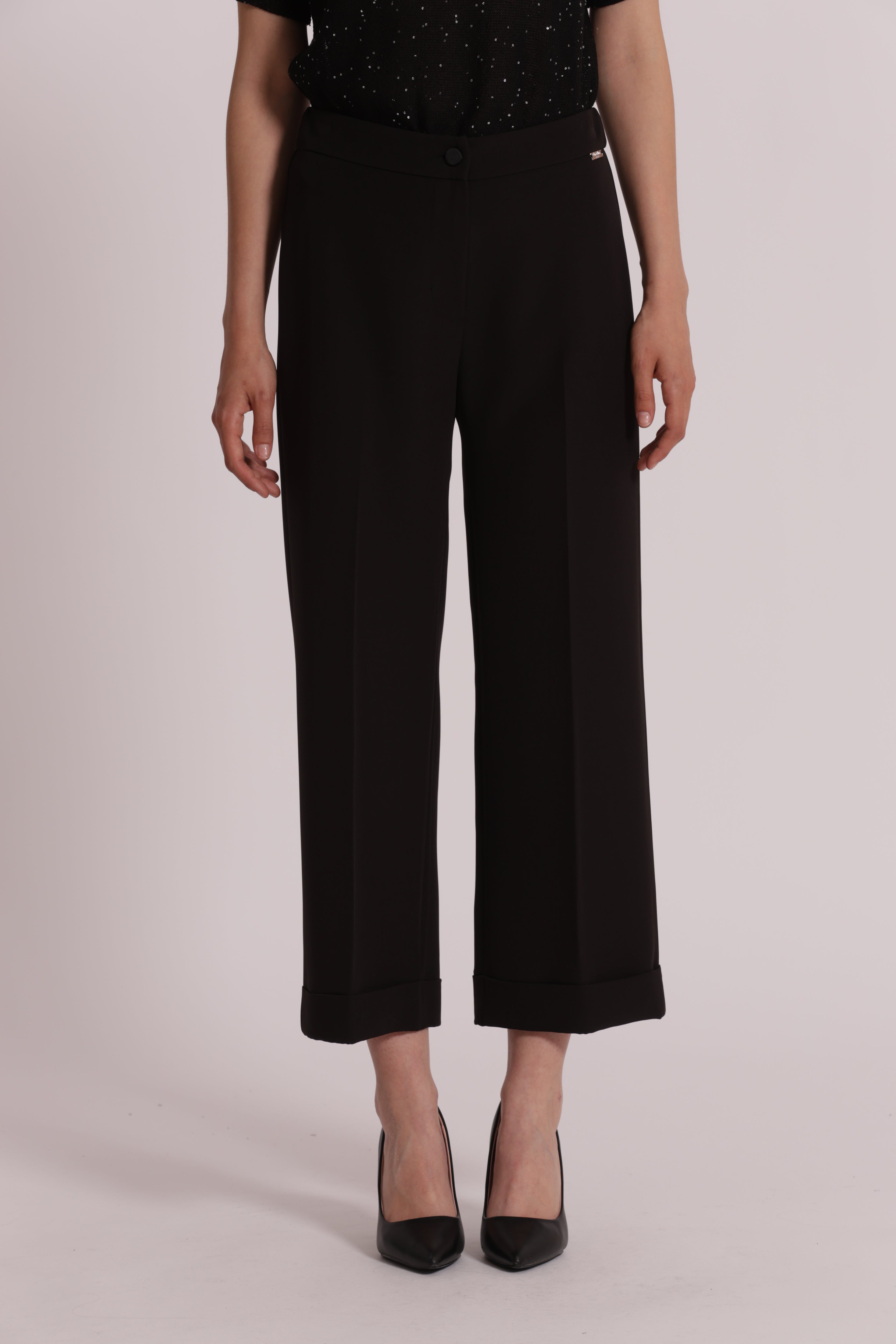 Mimi Mua pantaloni con risvolto neri elasticizzati