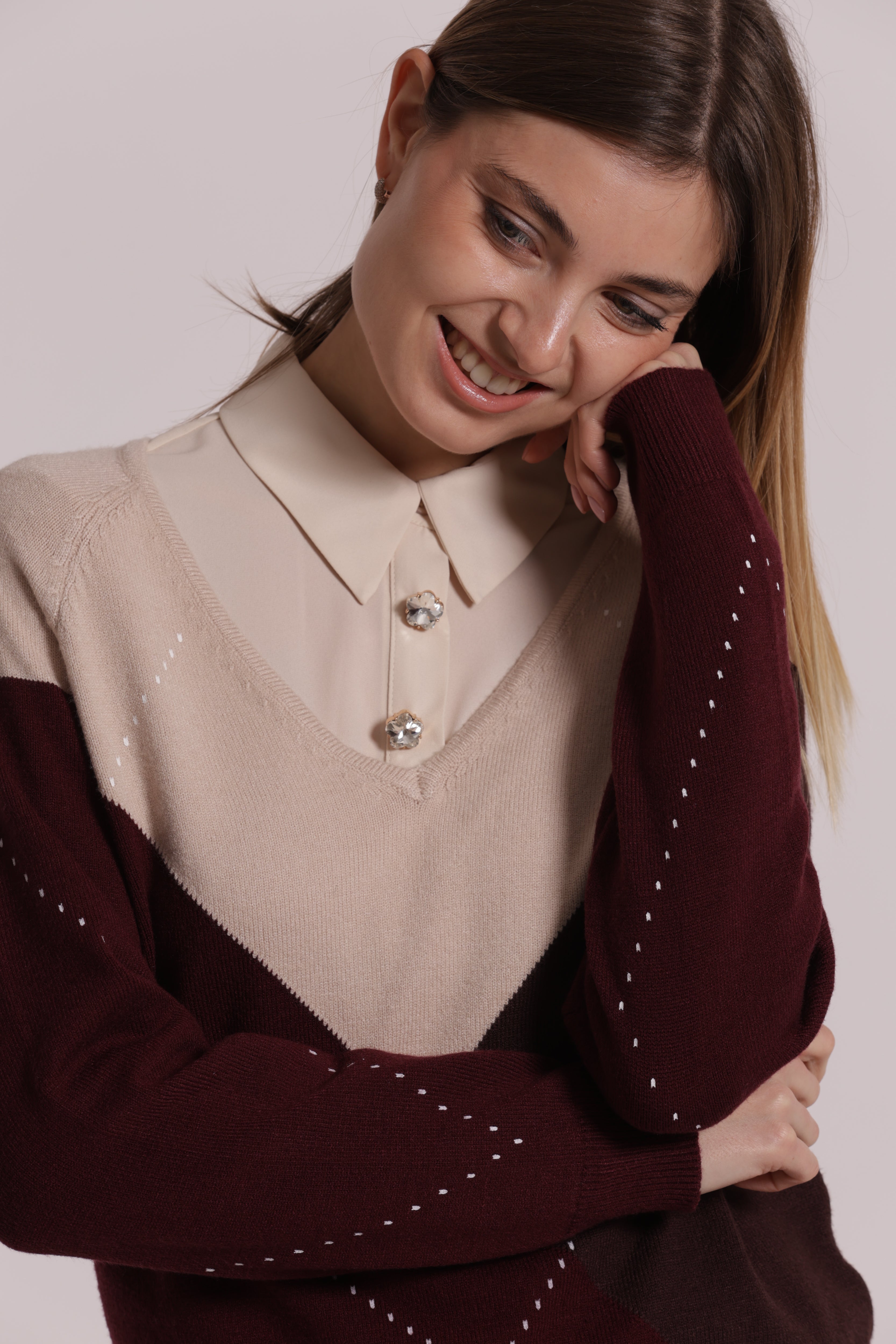 Mimi Mua rombi scollo V maglia nero scollo a V