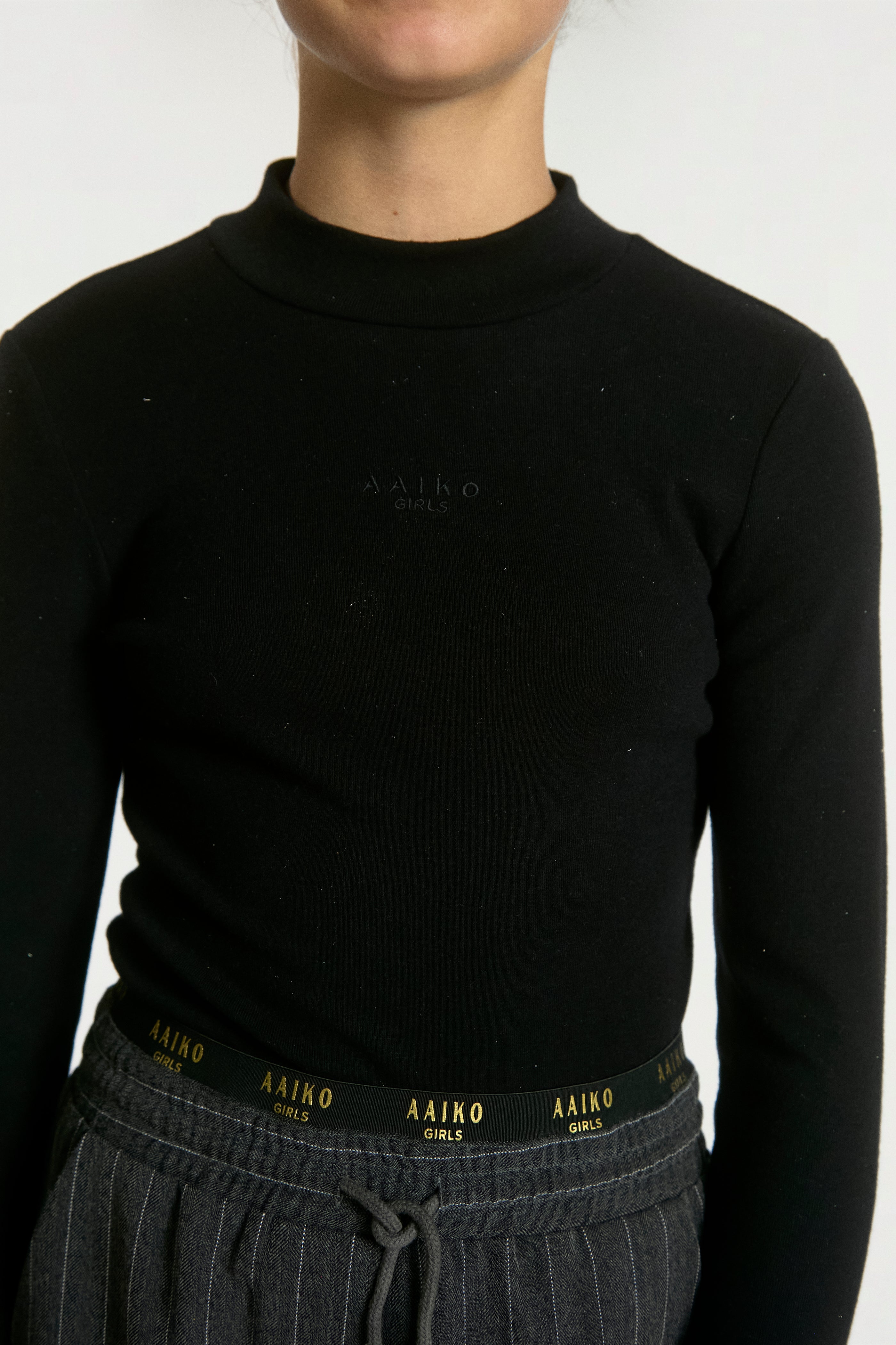 Aaiko Zera top nero lurex collo alto