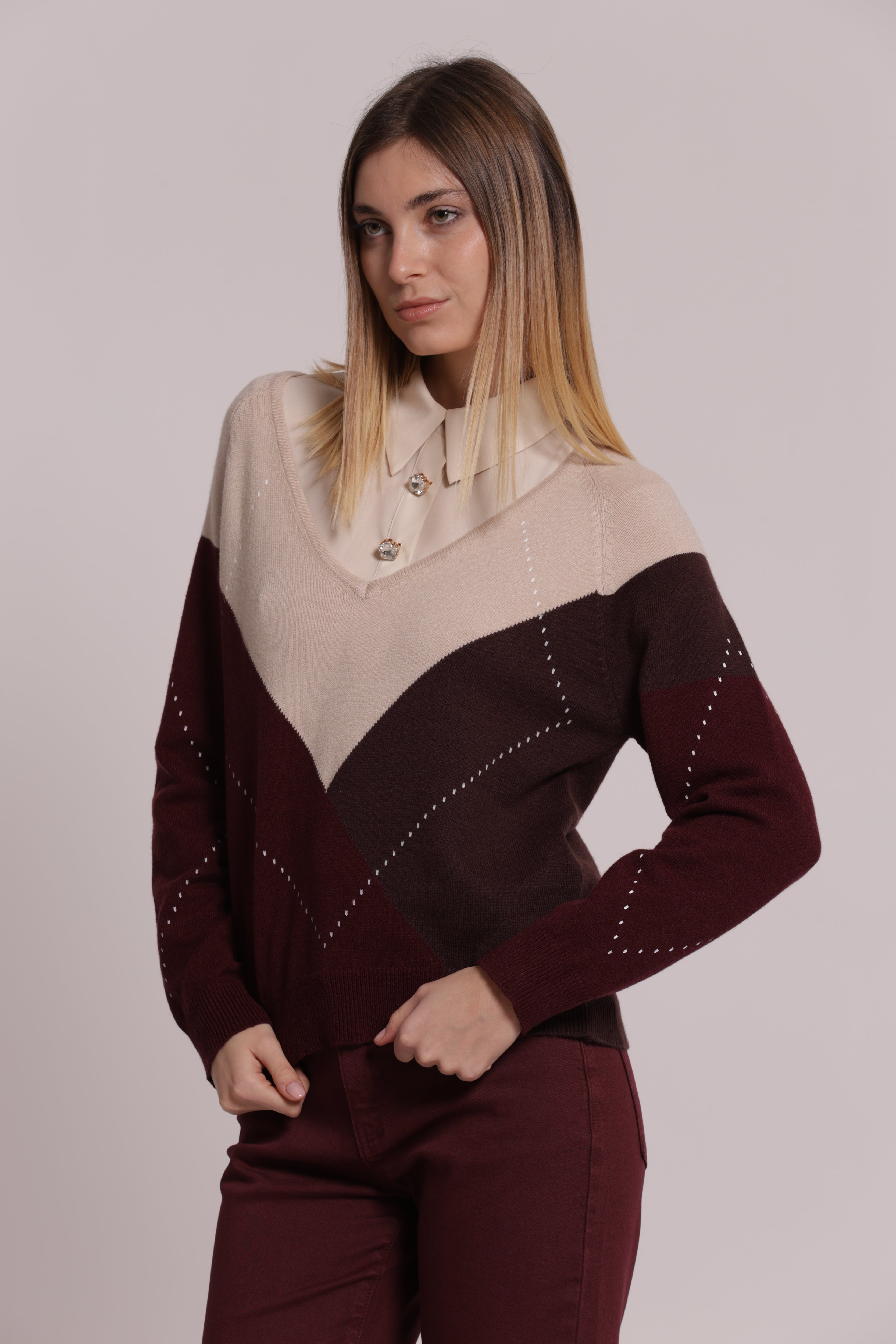 Mimi Mua rombi scollo V maglia nero scollo a V