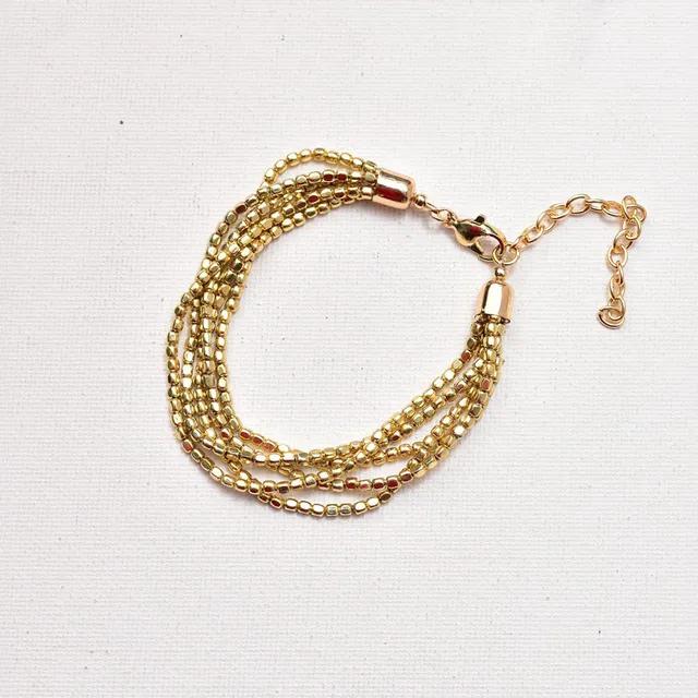 On Earth Shimmer bracciale perline dorato 19+7 cm