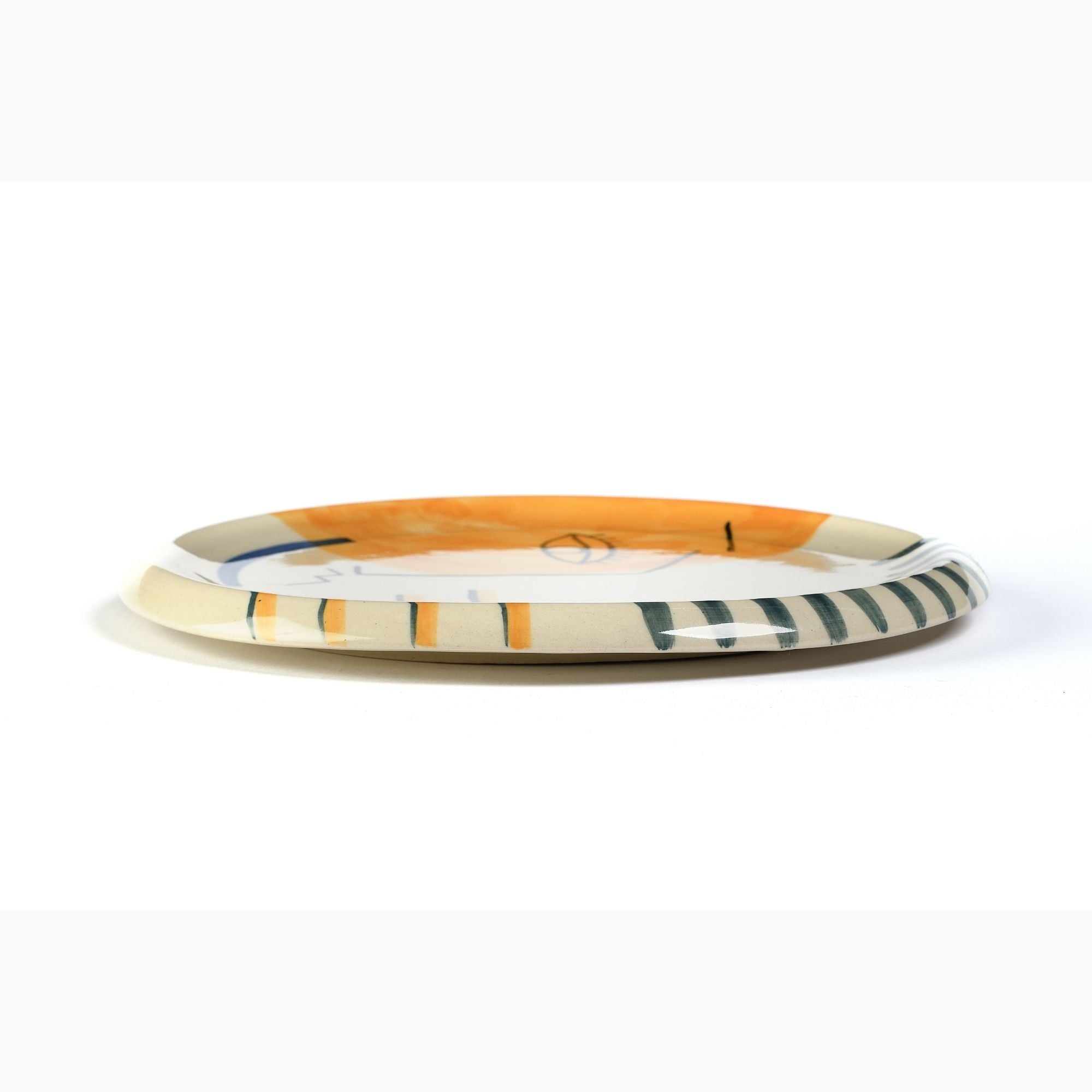 On Earth Cooperative Collection Face vassoio ceramica multicolore 25 cm
