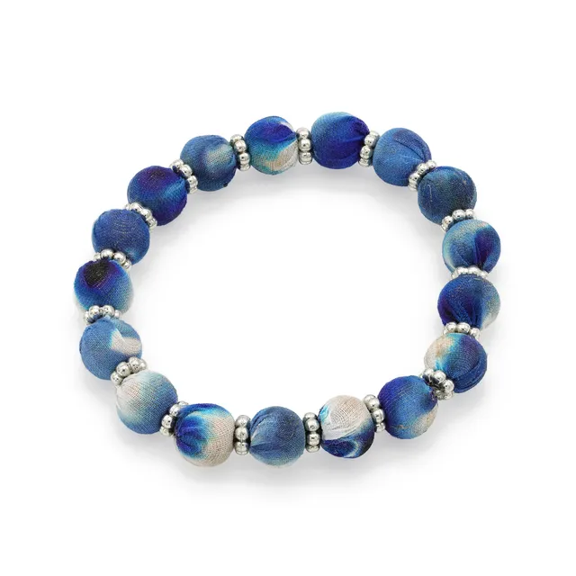 On Earth Cooperative Collection Blossom bracciale vetro cotone blu