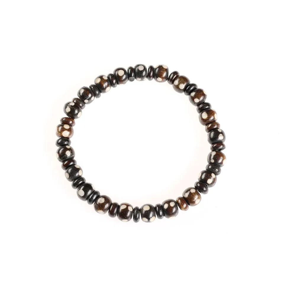 On Earth Cooperative Collection Custode bracciale osso nero elasticizzato