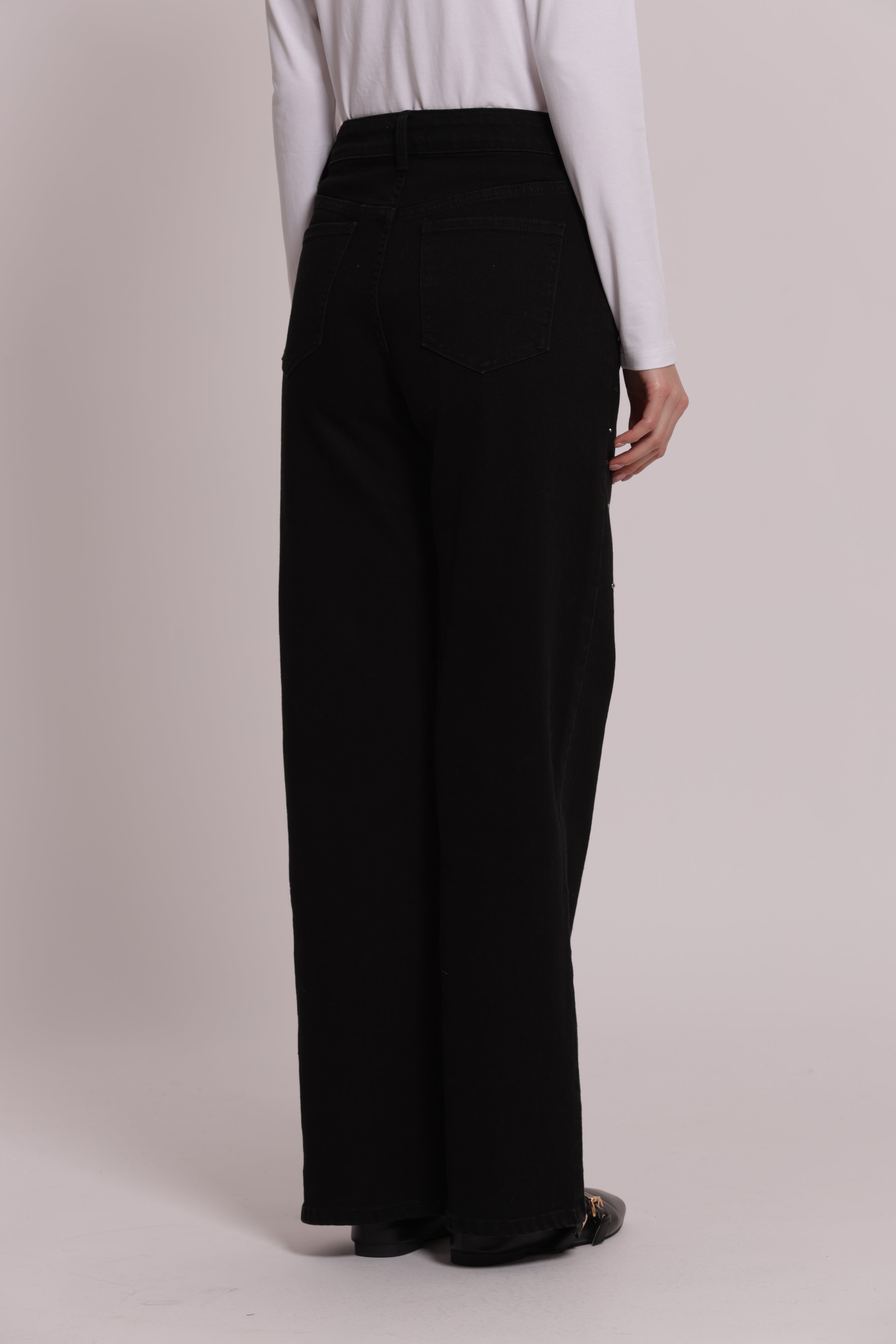 Mimi Mua jeans wide leg borchie e strass nero