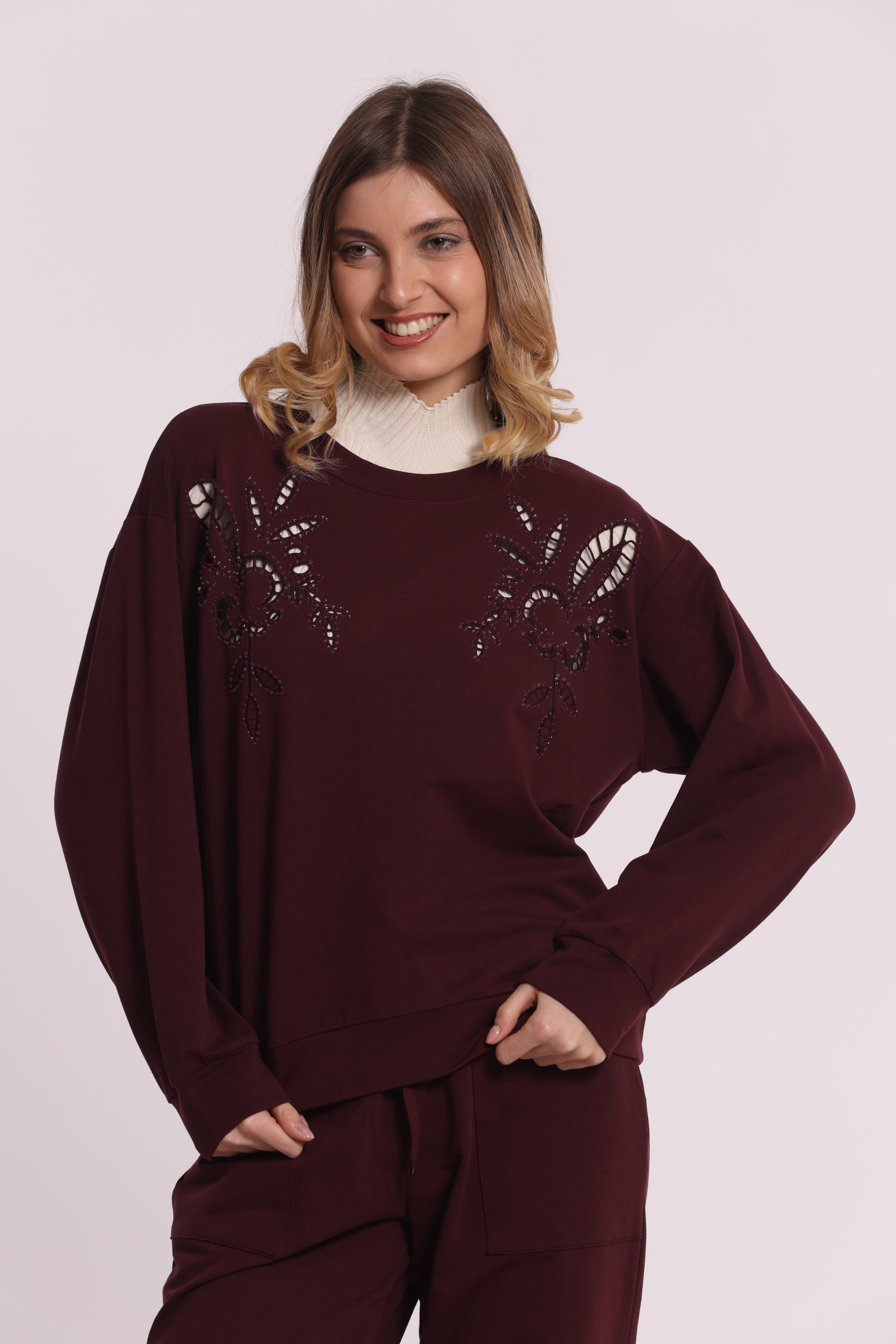 Mimi Mua felpa dettagli traforati e strass