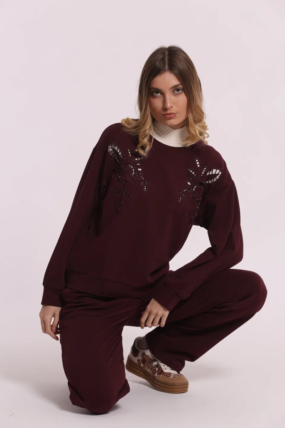 Mimi Mua felpa dettagli traforati e strass