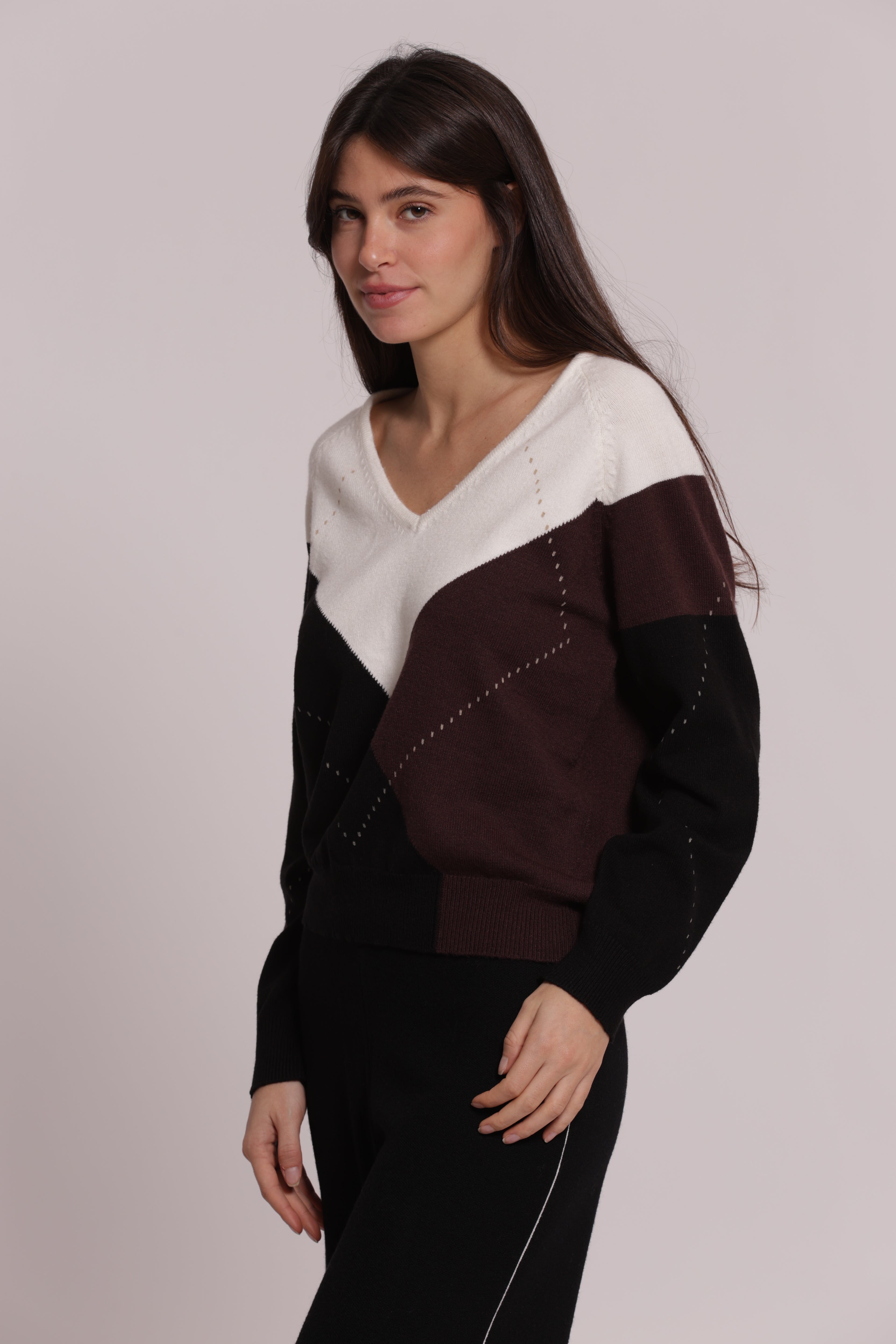 Mimi Mua rombi scollo V maglia nero scollo a V